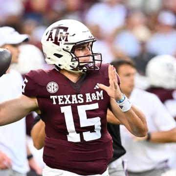 Aug 31, 2024; College Station, Texas, USA; Texas A&M Aggies quarterback Conner Weigman (15) warms up prior to the game against the Notre Dame Fighting Irish at Kyle Field. Mandatory Credit: Maria Lysaker-USA TODAY Sports