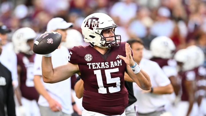 Aug 31, 2024; College Station, Texas, USA; Texas A&M Aggies quarterback Conner Weigman (15) warms up prior to the game against the Notre Dame Fighting Irish at Kyle Field. Mandatory Credit: Maria Lysaker-USA TODAY Sports