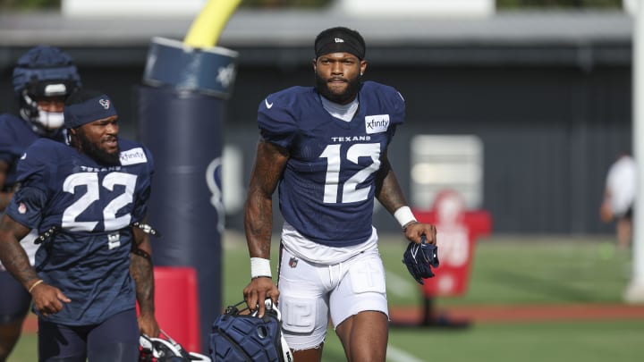 Jul 29, 2024; Houston, TX, USA; Houston Texans wide receiver Nico Collins (12) during training camp at Houston Methodist Training Center. Mandatory Credit: Troy Taormina-USA TODAY Sports