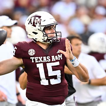 Aug 31, 2024; College Station, Texas, USA; Texas A&M Aggies quarterback Conner Weigman (15) warms up prior to the game against the Notre Dame Fighting Irish at Kyle Field. Mandatory Credit: Maria Lysaker-Imagn Images