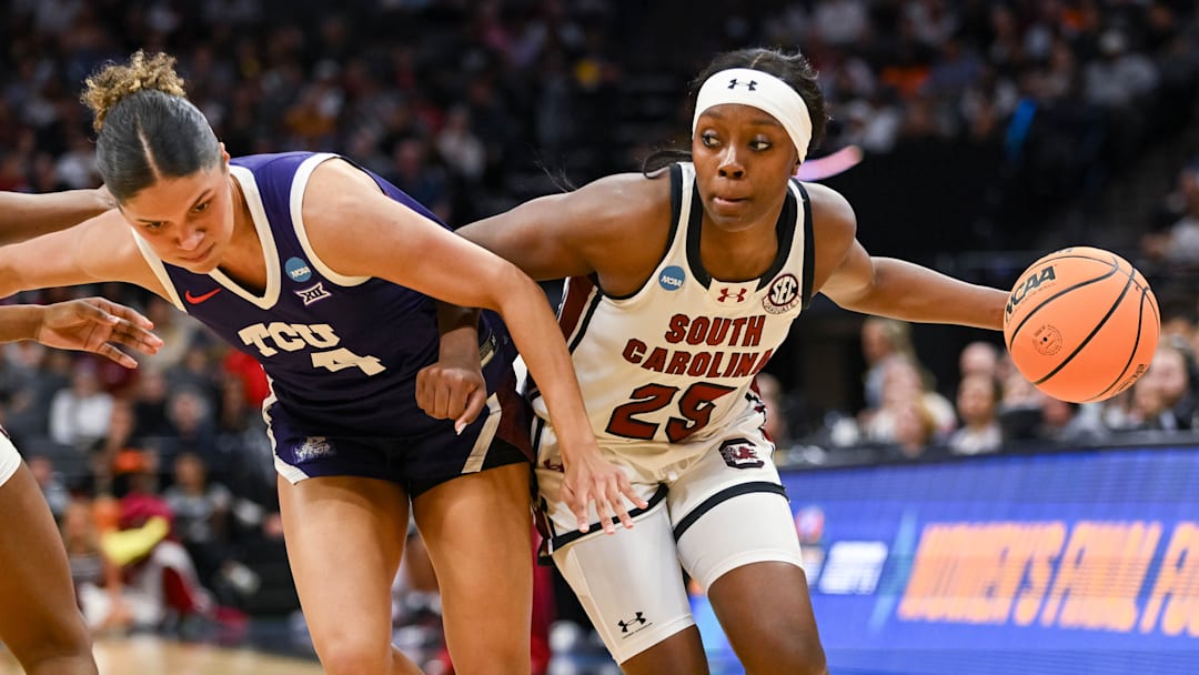 Mar 30, 2026; Sacramento, CA, USA;  South Carolina Gamecocks guard Raven Johnson (25) drives to the basket against Texas Christian University Horned Frogs guard Donovyn Hunter (4) in an Elite Eight game in the Sacramento Regional 4 of the women's 2026 NCAA Tournament at the Golden 1 Center. Mandatory Credit: Ed Szczepanski-Imagn Images