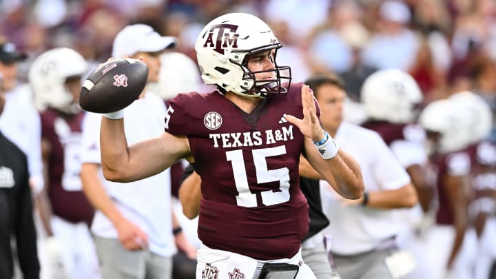 Aug 31, 2024; College Station, Texas, USA; Texas A&M Aggies quarterback Conner Weigman (15) warms up prior to the game against the Notre Dame Fighting Irish at Kyle Field.