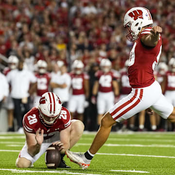 Aug 30, 2024; Madison, Wisconsin, USA;  Wisconsin Badgers kicker Nathanial Vakos (90) attempts to kick a field goal during the game against the Western Michigan Broncos at Camp Randall Stadium. 