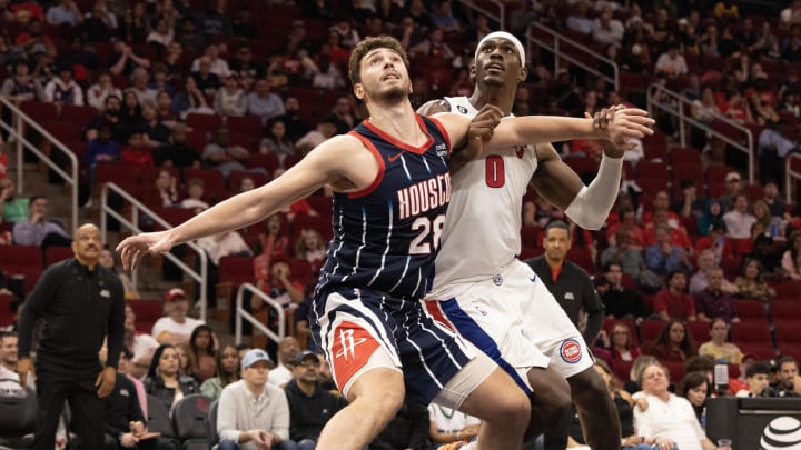 Mar 31, 2023; Houston, Texas, USA; Houston Rockets center Alperen Sengun (28) blocks out Detroit Pistons center Jalen Duren (0) after a Detroit Pistons free-throw  in the second half at Toyota Center. Mandatory Credit: Thomas Shea-USA TODAY Sports