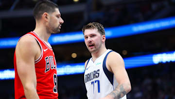 Nov 1, 2023; Dallas, Texas, USA;  Dallas Mavericks guard Luka Doncic (77) reacts in front of Chicago Bulls center Nikola Vucevic (9) during the first quarter at American Airlines Center. Mandatory Credit: Kevin Jairaj-Imagn Images