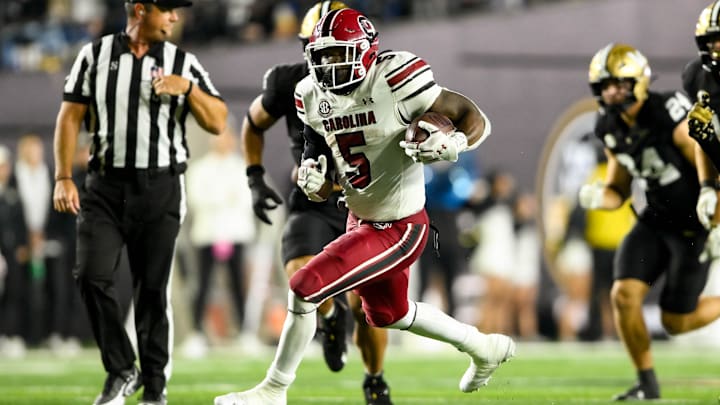 Nov 9, 2024; Nashville, Tennessee, USA;  South Carolina Gamecocks running back Raheim Sanders (5) runs the ball against the Vanderbilt Commodores during the second half at FirstBank Stadium. Mandatory Credit: Steve Roberts-Imagn Images