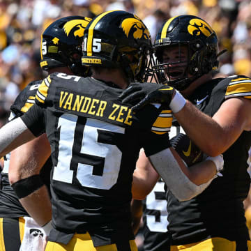 Aug 31, 2024; Iowa City, Iowa, USA; Iowa Hawkeyes wide receiver Reece Vander Zee (15) and tight end Luke Lachey (85) react after a touchdown by Vander Zee during the fourth quarter against the Illinois State Redbirds at Kinnick Stadium. Mandatory Credit: Jeffrey Becker-USA TODAY Sports