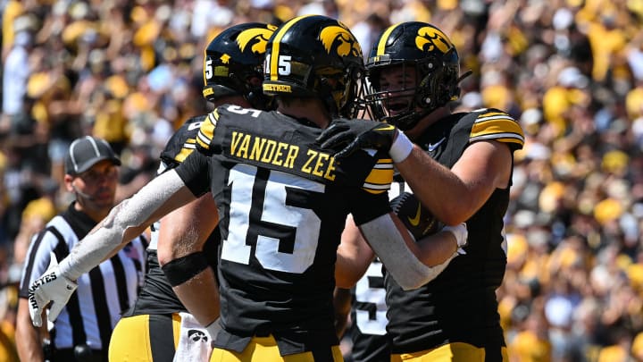 Aug 31, 2024; Iowa City, Iowa, USA; Iowa Hawkeyes wide receiver Reece Vander Zee (15) and tight end Luke Lachey (85) react after a touchdown by Vander Zee during the fourth quarter against the Illinois State Redbirds at Kinnick Stadium. Mandatory Credit: Jeffrey Becker-USA TODAY Sports