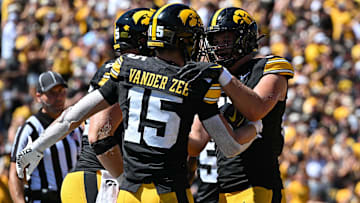 Aug 31, 2024; Iowa City, Iowa, USA; Iowa Hawkeyes wide receiver Reece Vander Zee (15) and tight end Luke Lachey (85) react after a touchdown by Vander Zee during the fourth quarter against the Illinois State Redbirds at Kinnick Stadium. Mandatory Credit: Jeffrey Becker-Imagn Images