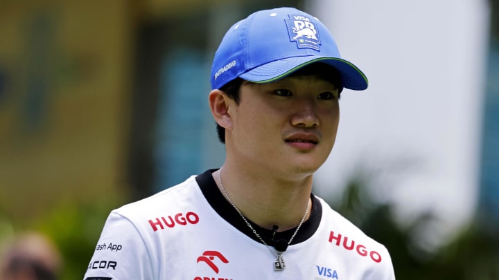 May 2, 2024; Miami Gardens, Florida, USA; RB racing driver Yuki Tsunoda (22) walks into the team village in advance of the F1 Miami Grand Prix at the Miami International Autodrome. Mandatory Credit: Peter Casey-USA TODAY Sports