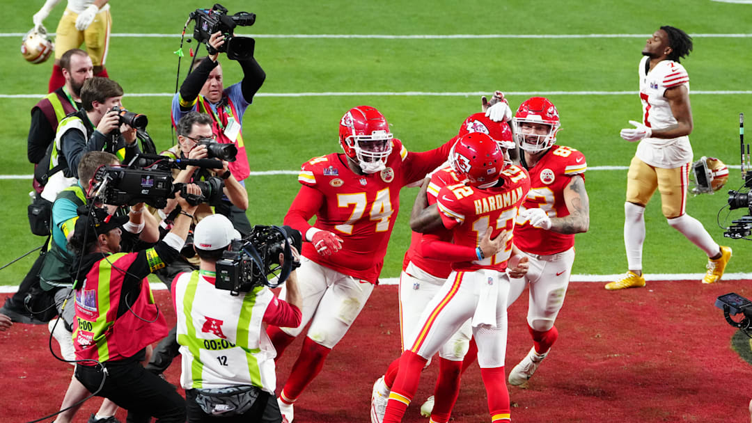 Feb 11, 2024; Paradise, Nevada, USA;  Kansas City Chiefs wide receiver Mecole Hardman Jr. (12) celebrates after scoring the winning touchdown against the San Francisco 49ers during overtime in Super Bowl LVIII at Allegiant Stadium. Mandatory Credit: Stephen R. Sylvanie-Imagn Images