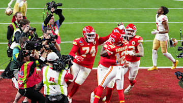 Feb 11, 2024; Paradise, Nevada, USA;  Kansas City Chiefs wide receiver Mecole Hardman Jr. (12) celebrates after scoring the winning touchdown against the San Francisco 49ers during overtime in Super Bowl LVIII at Allegiant Stadium. Mandatory Credit: Stephen R. Sylvanie-Imagn Images