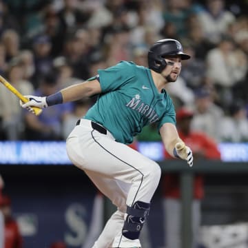 Seattle Mariners catcher Cal Raleigh (29) hits a two RBI double against the Los Angeles Angels during the sixth inning at T-Mobile Park on June 1.
