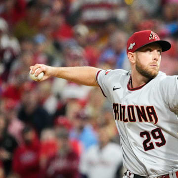 Merrill Kelly, reportedly heading to the Rangers, pitches against the Phillies.