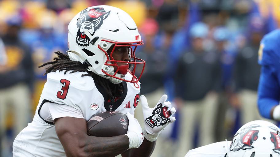 North Carolina State Wolfpack running back Hollywood Smothers runs the ball.