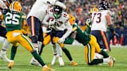 Dec 7, 2025; Green Bay, Wisconsin, USA; Chicago Bears wide receiver Luther Burden III (10) rushes the ball during the fourth quarter against the Green Bay Packers at Lambeau Field. Mandatory Credit: Jeff Hanisch-Imagn Images