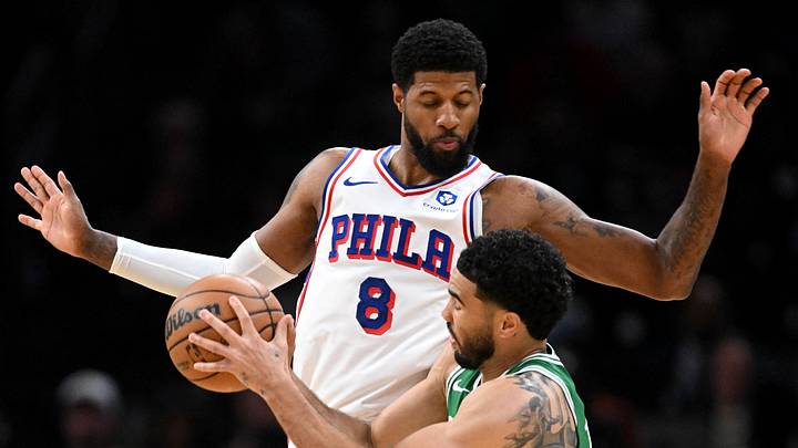 Apr 21, 2026; Boston, Massachusetts, USA; Philadelphia 76ers forward Paul George (8) defends Boston Celtics forward Jayson Tatum (0) in the first half of a game two of the first round of the 2026 NBA Playoffs at TD Garden. Mandatory Credit: Brian Fluharty-Imagn Images