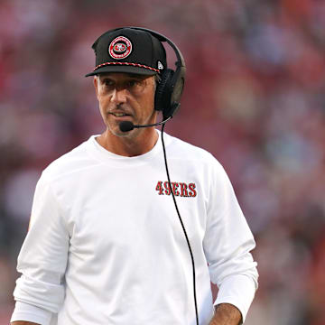 Aug 18, 2024; Santa Clara, California, USA; San Francisco 49ers head coach Kyle Shanahan walks down the sideline during action against the New Orleans Saints in the third quarter at Levi's Stadium. Mandatory Credit: Cary Edmondson-Imagn Images