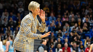Iowa head coach Jan Jensen calls to players during the Drake vs. Iowa basketball game at Knapp Center on Sunday, Nov. 17, 2024, in Des Moines.