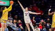Mickayla Perdue attempting to block a shot against CSU Bakersfield.