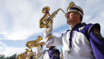 Sep 24, 2022; Seattle, Washington, USA; Washington Huskies marching band members perform before outside Alaska Airlines Field at Husky Stadium before a game against the Stanford Cardinal. Mandatory Credit: Joe Nicholson-USA TODAY Sports