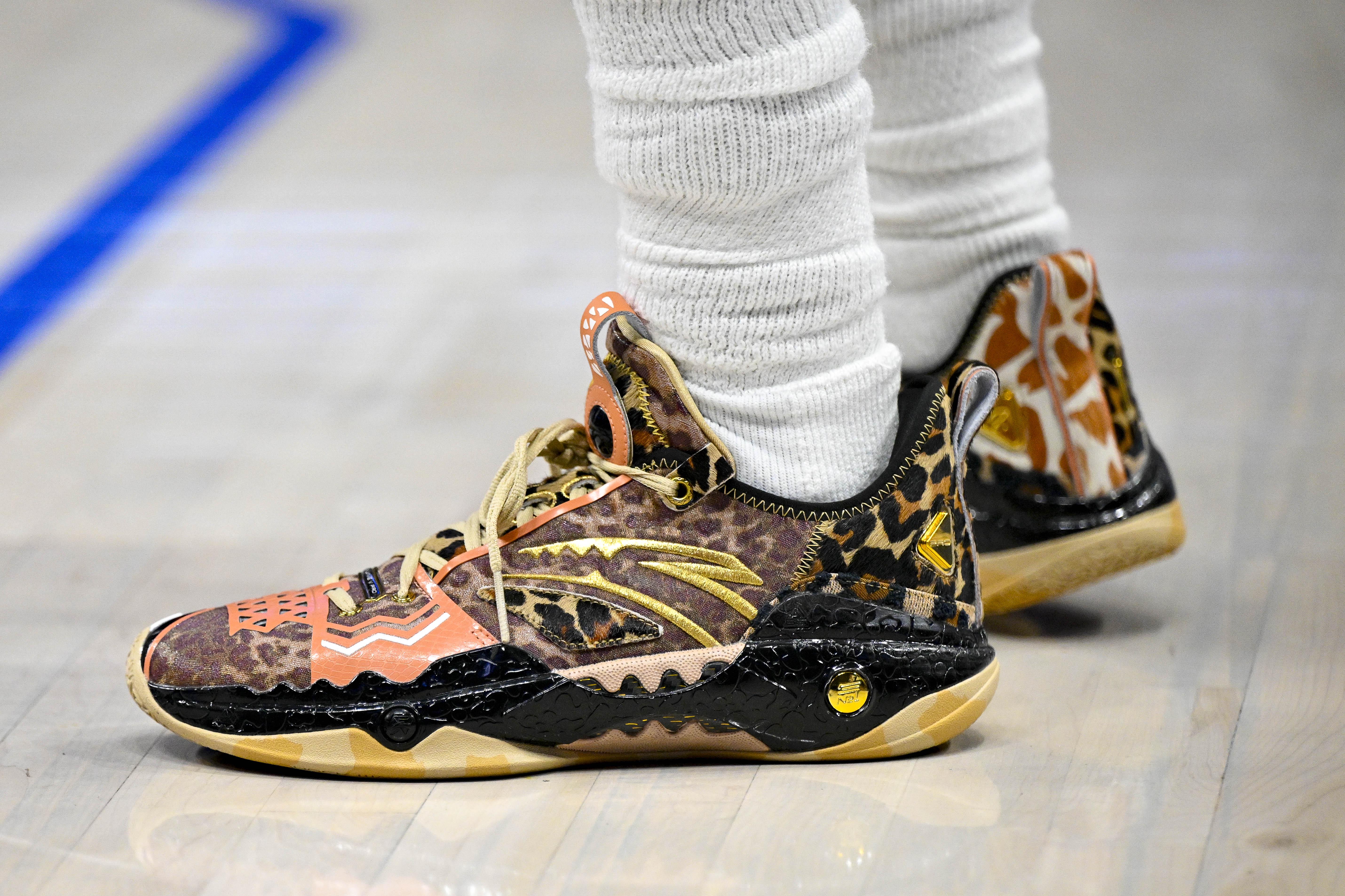 Dallas Mavericks guard Kyrie Irving's animal print ANTA sneakers.