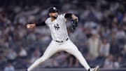 Jul 10, 2025; Bronx, New York, USA; New York Yankees relief pitcher Devin Williams (38) pitches against the Seattle Mariners during the tenth inning at Yankee Stadium. Mandatory Credit: Brad Penner-Imagn Images