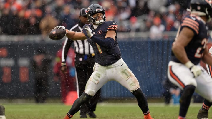 Dec 31, 2023; Chicago, Illinois, USA;  Chicago Bears quarterback Justin Fields (1) passes against the Atlanta Falcons at Soldier Field. Mandatory Credit: Jamie Sabau-USA TODAY Sports