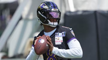 Jul 23, 2025; Owings Mills, MD, USA; Baltimore Ravens quarterback Lamar Jackson (8) warms up during training camp at Under Armour Performance Center. Mandatory Credit: Mitch Stringer-Imagn Images