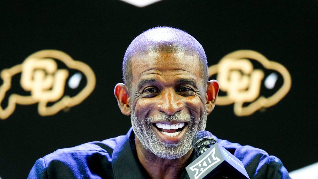 Jul 7, 2026; Frisco, TX, USA;  Colorado head coach Deion Sanders speaks to reporters during Big 12 Conference Football Media Days at The Star.  