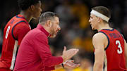 Jan 25, 2025; Columbia, Missouri, USA; Mississippi Rebels head coach Chris Beard talks with guard Sean Pedulla (3) during the first half against the Missouri Tigers at Mizzou Arena. Mandatory Credit: Jay Biggerstaff-Imagn Images
