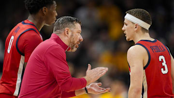 Jan 25, 2025; Columbia, Missouri, USA; Mississippi Rebels head coach Chris Beard talks with guard Sean Pedulla (3) during the first half against the Missouri Tigers at Mizzou Arena. Mandatory Credit: Jay Biggerstaff-Imagn Images