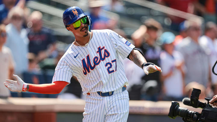 Aug 21, 2024; New York City, New York, USA; New York Mets third baseman Mark Vientos (27) reacts after hitting a solo home run during the seventh inning against the Baltimore Orioles at Citi Field. Mandatory Credit: Vincent Carchietta-USA TODAY Sports