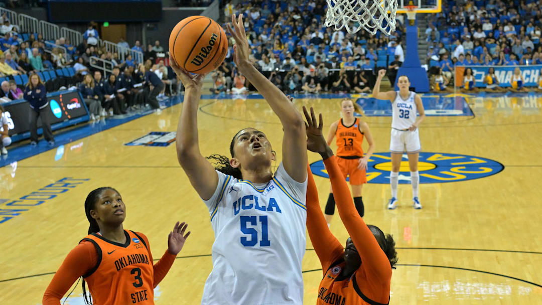 Mar 23, 2026; Los Angeles, CA, USA; UCLA Bruins center Lauren Betts (51) drives past Oklahoma State Cowboys guard Micah Gray (3) and forward Achol Akot (11) in the first half at Pauley Pavilion. Mandatory Credit: Jayne Kamin-Oncea-Imagn Images Mar 23, 2026; Los Angeles, CA, USA; UCLA Bruins center Lauren Betts (51) drives past Oklahoma State Cowboys guard Micah Gray (3) and forward Achol Akot (11) in the first half at Pauley Pavilion. Mandatory Credit: Jayne Kamin-Oncea-Imagn Images