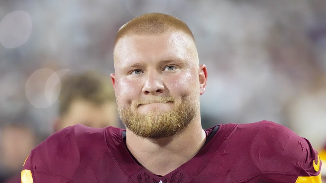 Sep 11, 2025; Green Bay, Wisconsin, USA;  Washington Commanders center Tyler Biadasz (63) prior to the game against the Green Bay Packers at Lambeau Field. Mandatory Credit: Jeff Hanisch-Imagn Images