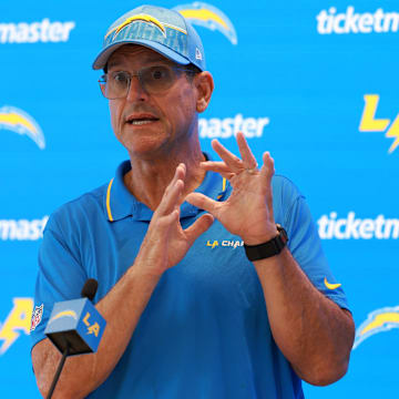 Jul 24, 2024; El Segundo, CA, USA;  Los Angeles Chargers head coach Jim Harbaugh speaks to the media after the first day of training camp at The Bolt. Mandatory Credit: Kiyoshi Mio-Imagn Images