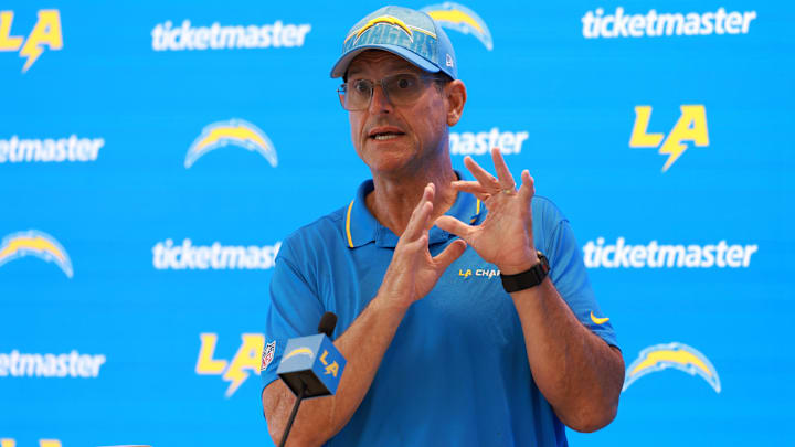 Jul 24, 2024; El Segundo, CA, USA;  Los Angeles Chargers head coach Jim Harbaugh speaks to the media after the first day of training camp at The Bolt. Mandatory Credit: Kiyoshi Mio-Imagn Images