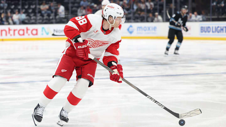 Mar 24, 2025; Salt Lake City, Utah, USA; Detroit Red Wings right wing Patrick Kane (88) skates with the puck against the Utah Hockey Club during the second period at Delta Center. Mandatory Credit: Rob Gray-Imagn Images