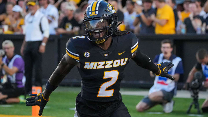 Aug 29, 2024; Columbia, Missouri, USA; Missouri Tigers cornerback Toriano Pride Jr. (2) celebrates after scoring against the Murray State Racers on a pick six during the first half at Faurot Field at Memorial Stadium. Mandatory Credit: Denny Medley-USA TODAY Sports