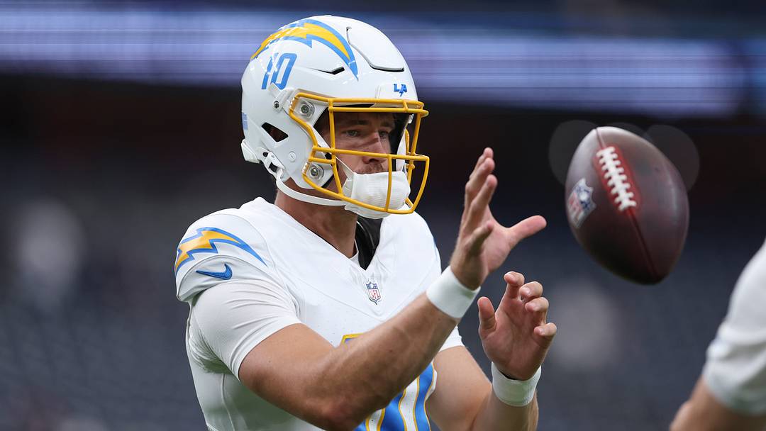 Aug 13, 2026; Houston, Texas, USA;  Los Angeles Chargers quarterback Justin Herbert (10) warms up before the game against the Houston Texans at Reliant Stadium. Mandatory Credit: Troy Taormina-Imagn Images