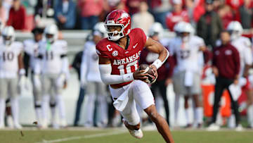Nov 1, 2025; Fayetteville, Arkansas, USA; Arkansas Razorbacks quarterback Taylen Green (10) rushes during the first quarter against the Mississippi State Bulldogs at Donald W. Reynolds Razorback Stadium. Mandatory Credit: Nelson Chenault-Imagn Images