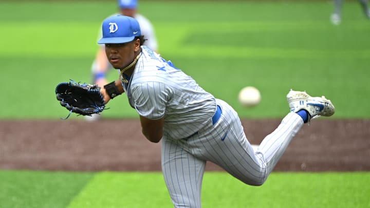 Jun 8, 2025; Durham, NC, USA; Duke Blue Devils outfielder and pitcher Kyle Johnson (5) pitches the ball in the second inning against the Murray State Racers during the Durham Super Regionals at Jack Coombs Field. Mandatory Credit: Zachary Taft-Imagn Images Jun 8, 2025; Durham, NC, USA; Duke Blue Devils outfielder and pitcher Kyle Johnson (5) pitches the ball in the second inning against the Murray State Racers during the Durham Super Regionals at Jack Coombs Field. Mandatory Credit: Zachary Taft-Imagn Images