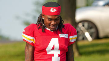 Jul 26, 2024; Kansas City, MO, USA; Kansas City Chiefs wide receiver Rashee Rice (4) walks down the hill from the locker room to the fields prior to training camp at Missouri Western State University. Mandatory Credit: Denny Medley-USA TODAY Sports