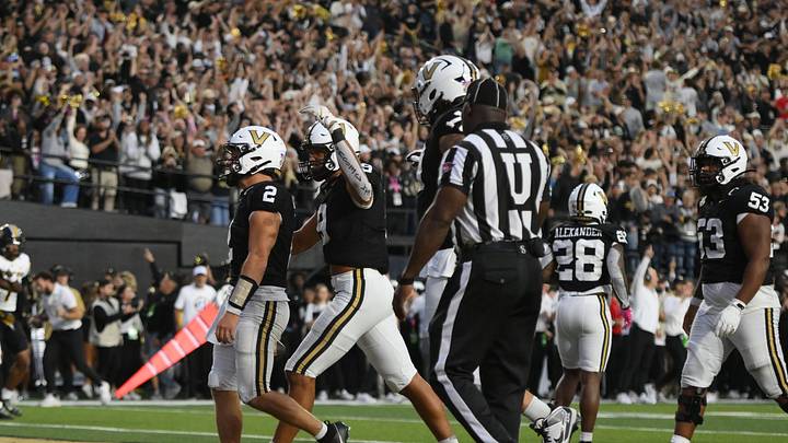 Oct 25, 2025; Nashville, Tennessee, USA; Vanderbilt Commodores quarterback Diego Pavia (2) celebrates his one-yard touchdown run against the Missouri Tigers during the fourth quarter at FirstBank Stadium. 