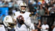 Nov 9, 2025; Charlotte, North Carolina, USA;  New Orleans Saints quarterback Tyler Shough (6) looks to pass in the first quarter at Bank of America Stadium. Mandatory Credit: Bob Donnan-Imagn Images