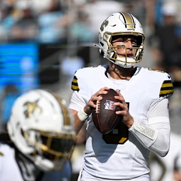 Nov 9, 2025; Charlotte, North Carolina, USA;  New Orleans Saints quarterback Tyler Shough (6) looks to pass in the first quarter at Bank of America Stadium. Mandatory Credit: Bob Donnan-Imagn Images