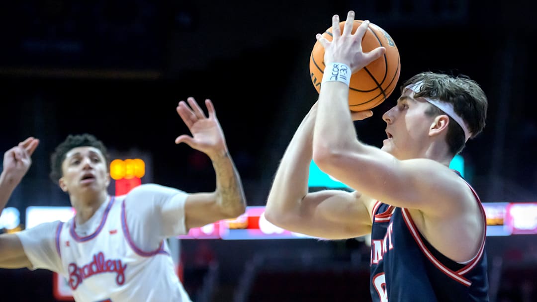 Belmont’s Tyler Lundblade, right, lines up one of his three-pointers against Bradley in the second half of their MVC basketball game Wednesday, Feb. 5, 2025 at Carver Arena. Lundblade dropped eight three-pointers and the Braves fell to the Bruins 80-77.