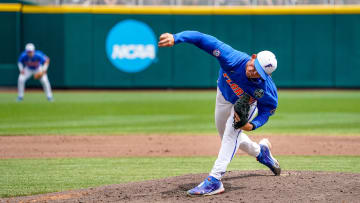 Jun 25, 2023; Omaha, NE, USA; Florida Gators starting pitcher Hurston Waldrep (12) throws a pitch against the LSU Tigers during the second inning at Charles Schwab Field Omaha. Mandatory Credit: Dylan Widger-USA TODAY Sports