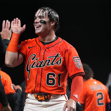 San Francisco Giants right fielder Drew Gilbert (61) celebrates after defeating the Los Angeles Dodgers at Oracle Park.