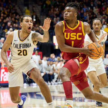 Feb 7, 2024; Berkeley, California, USA; USC Trojans guard Isaiah Collier (1) dribbles the ball against California Golden Bears guard Jaylon Tyson (20) during the second half of the game between the California Golden Bears and the USC Trojans at Haas Pavilion.  Mandatory Credit: Robert Edwards-USA TODAY Sports